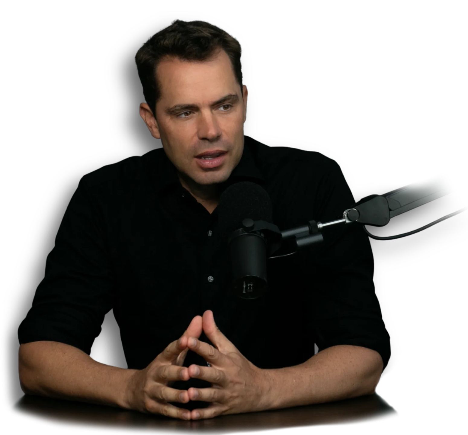 Eric Canori, advisor and consultant for entrepreneurs, leaders and high-performers talking to a microphone