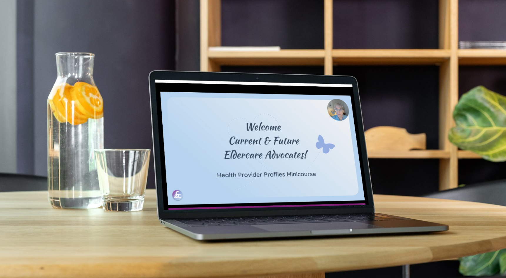 Laptop with lesson slide on table