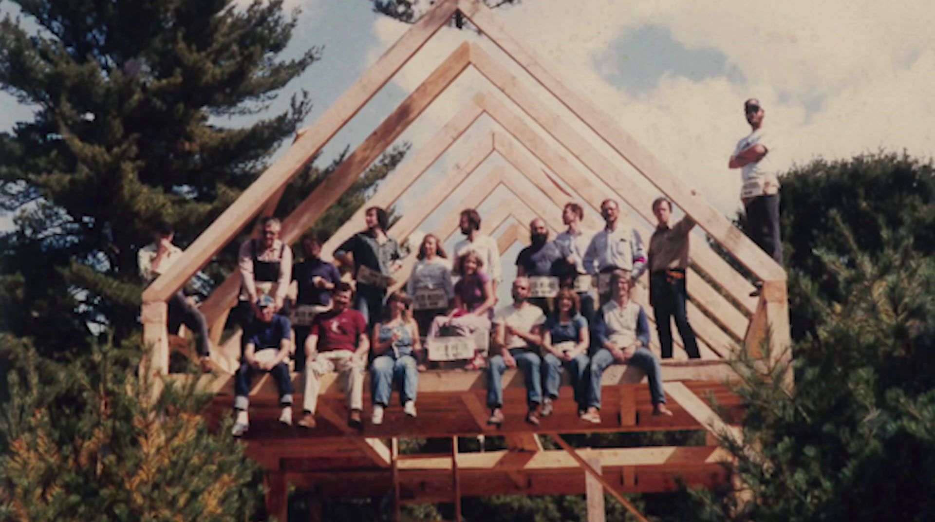 Shelter in-person class sitting on a wooden frame.