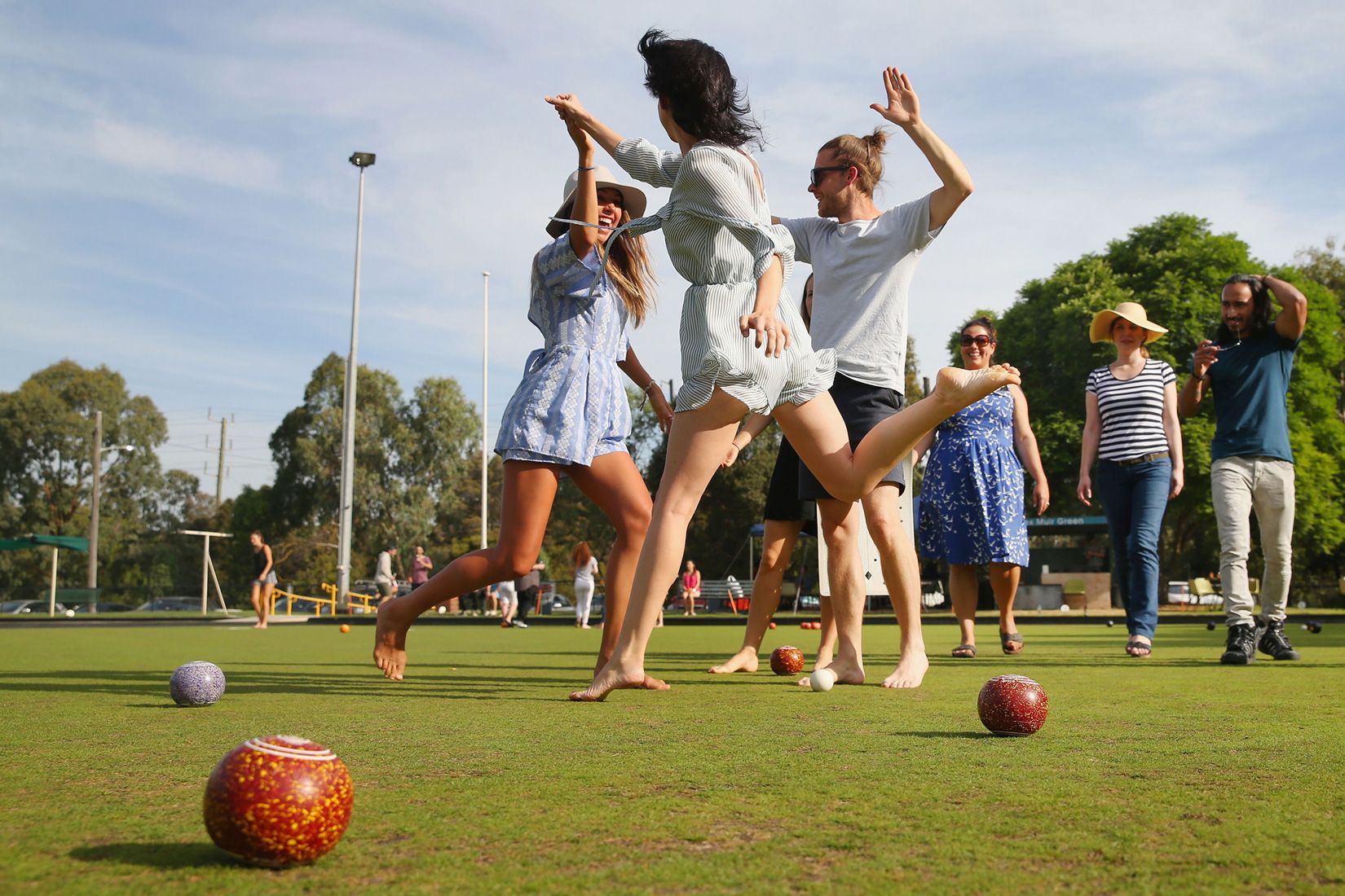 Lawn bowls barefoot