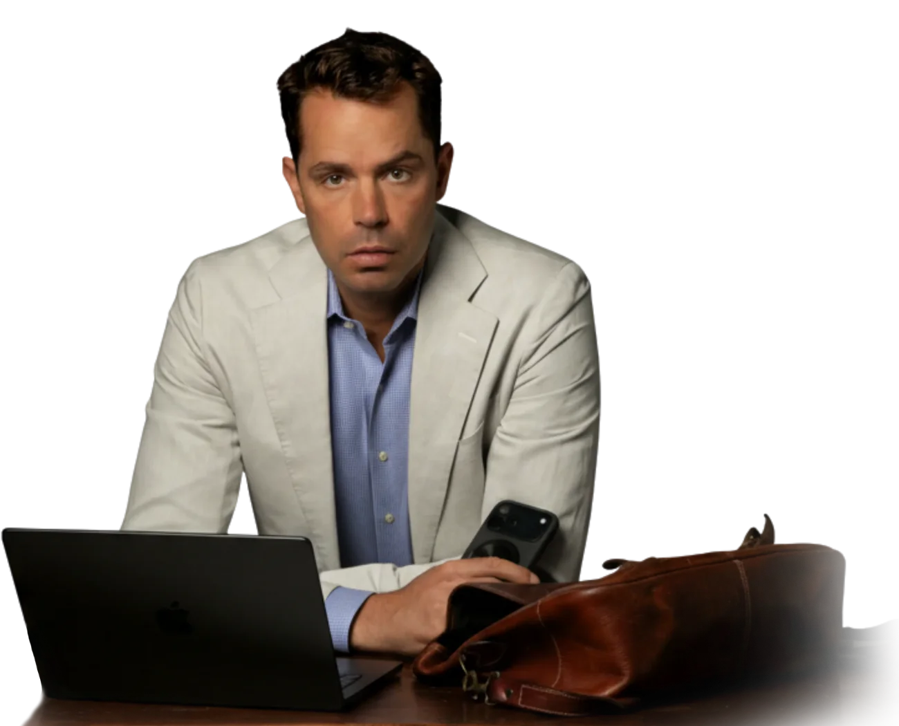 high-performance consultant for leaders and entrepreneurs, Eric Canori, by a laptop