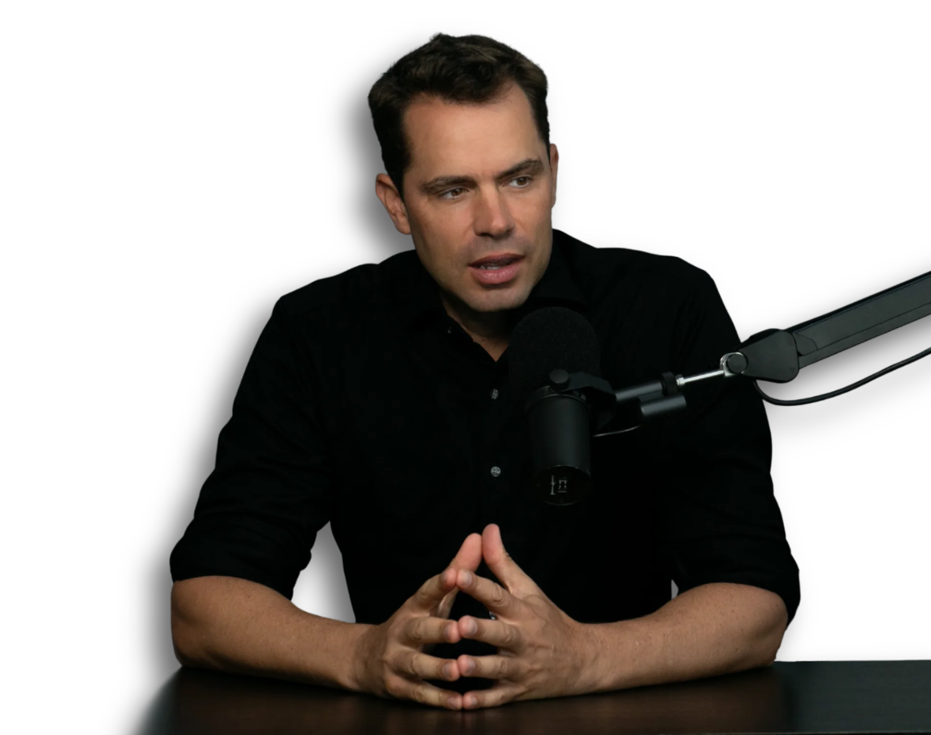 consultant for leaders, entrepreneurs and high-performers talking to a mic