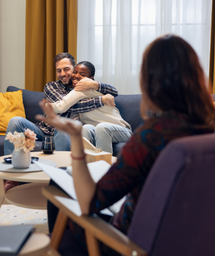 Relationship coach working with a couple during a non-clinical coaching session focused on communication and relationship goals.