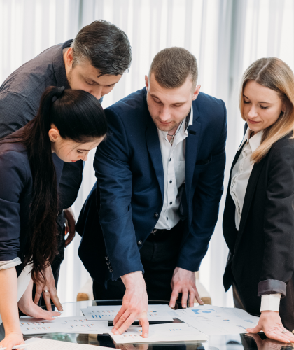 Executive and leadership coach working with organizational leaders during a professional coaching session focused on strategy and leadership development.
