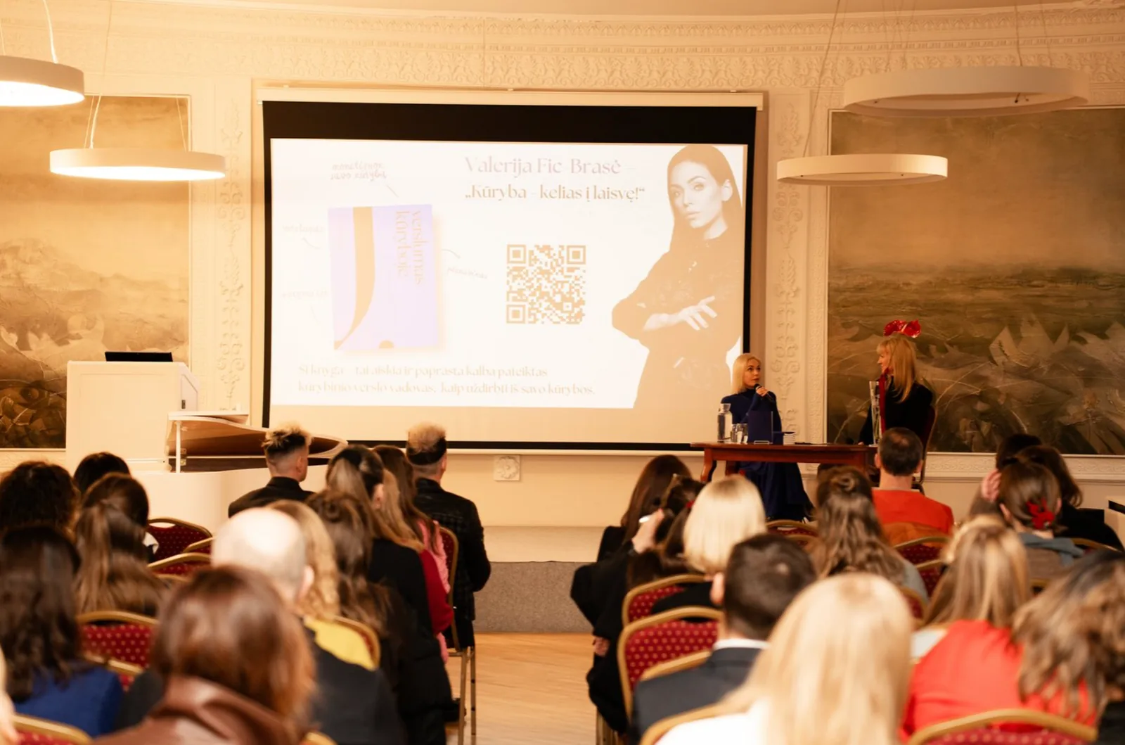 Valerija Fic Brasė speaking at a live creative business talk