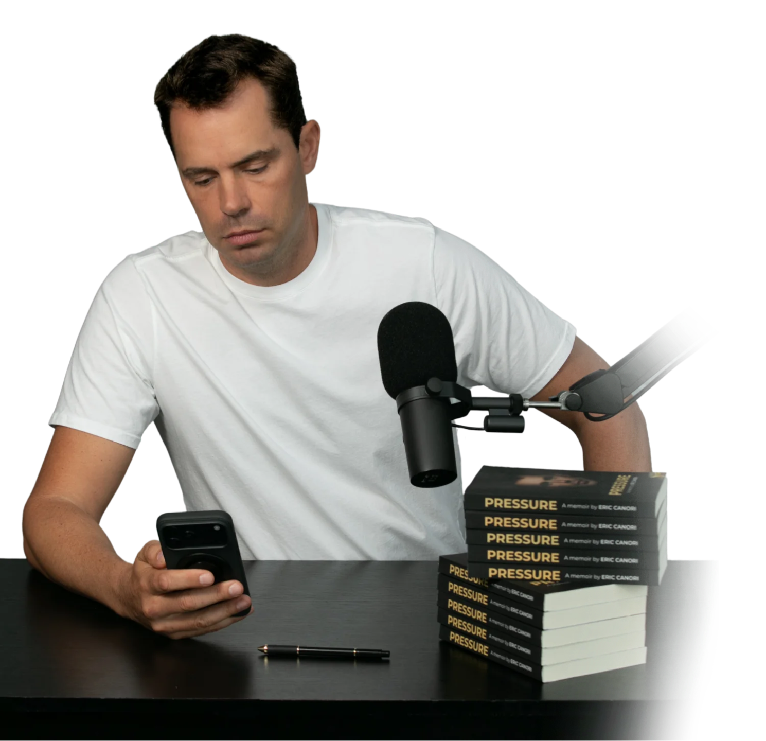 Eric Canori consulting entrepreneurs and leaders beside a desk with a phone