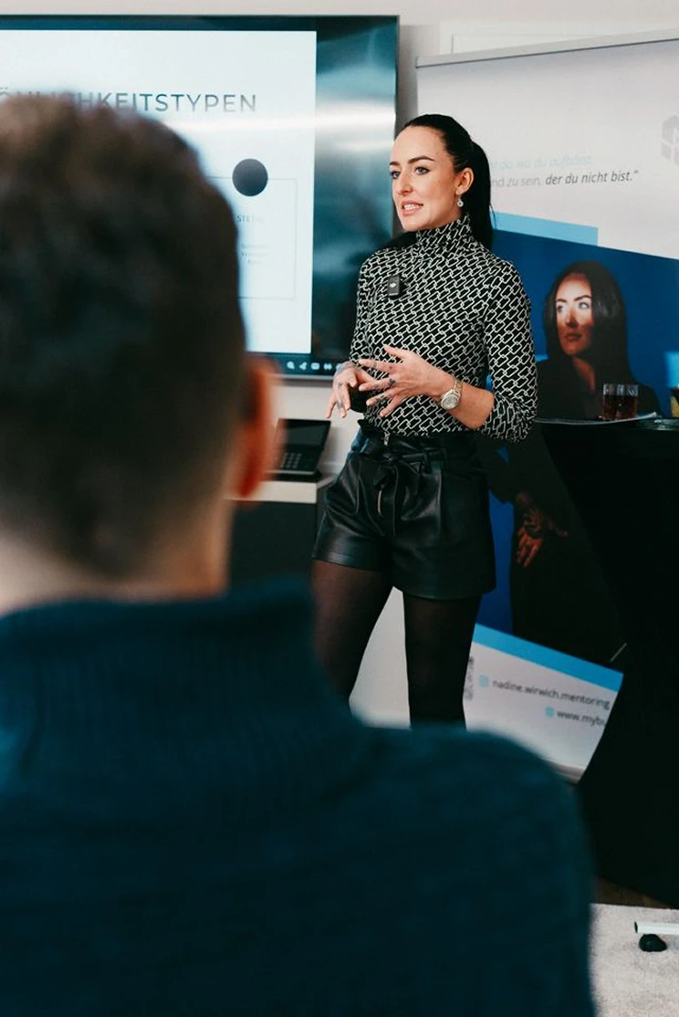 nadine giving speech on mybusiness consult event