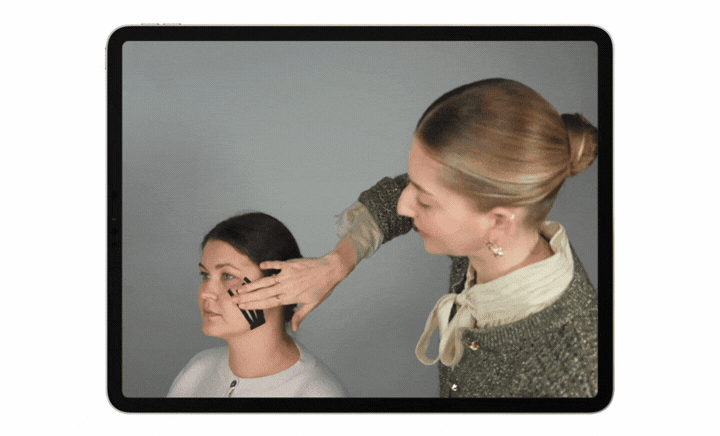 Image of Valeriia demonstrating face taping