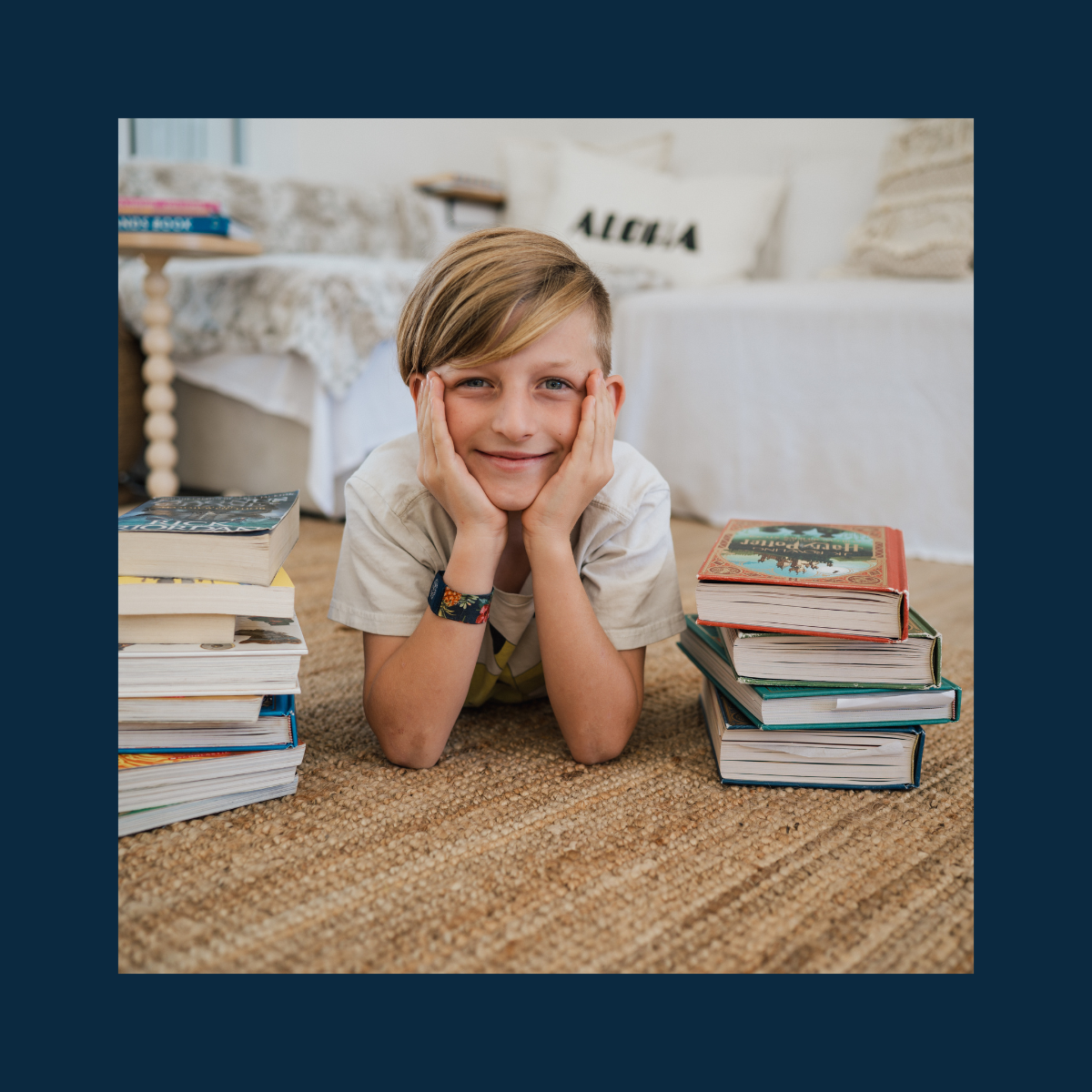 Confident Child with Pile of Books