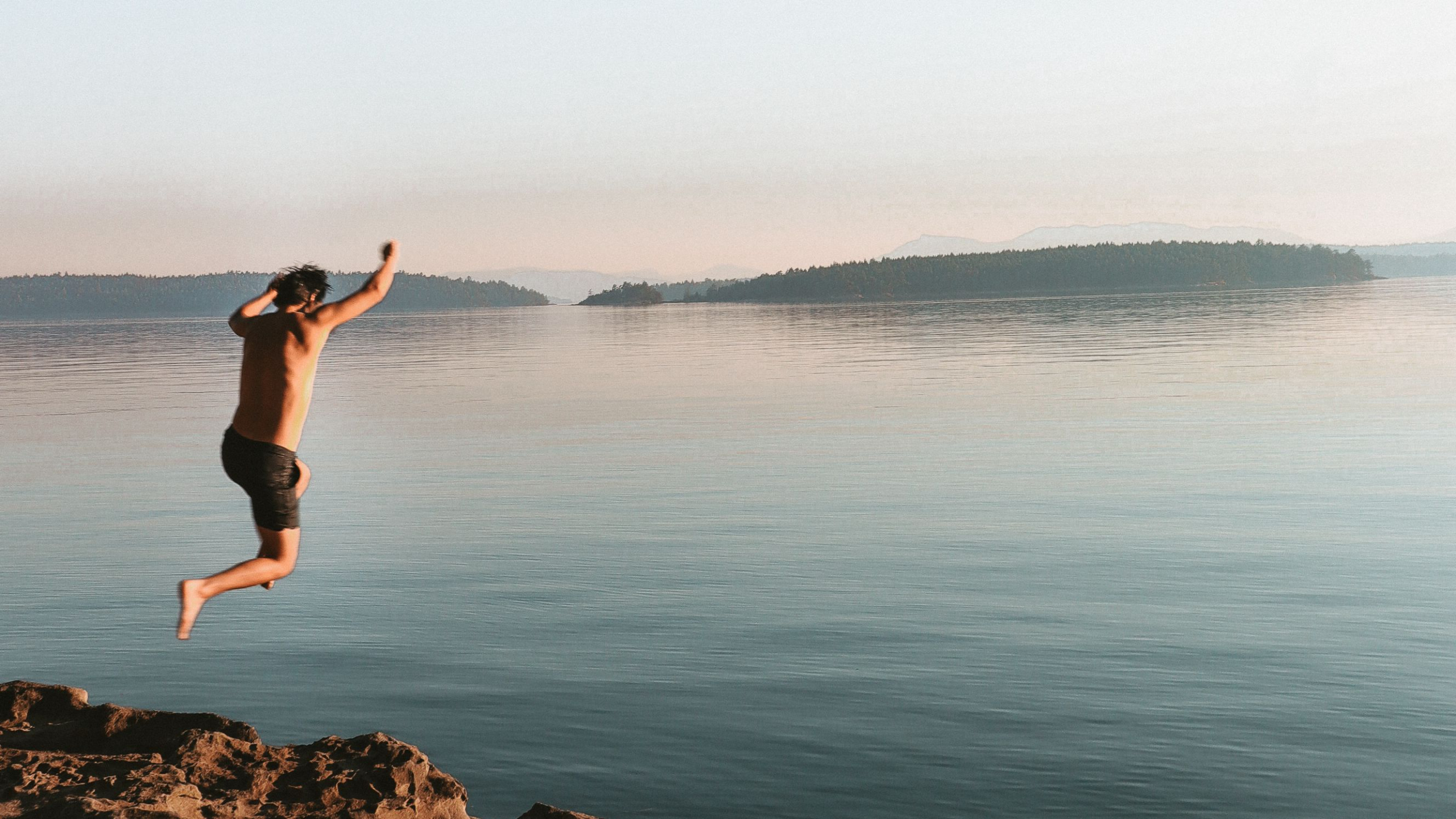 A man relaxing at home, representing the comfort and openness of individual therapy for men at Metro-Detroit Men's Therapy