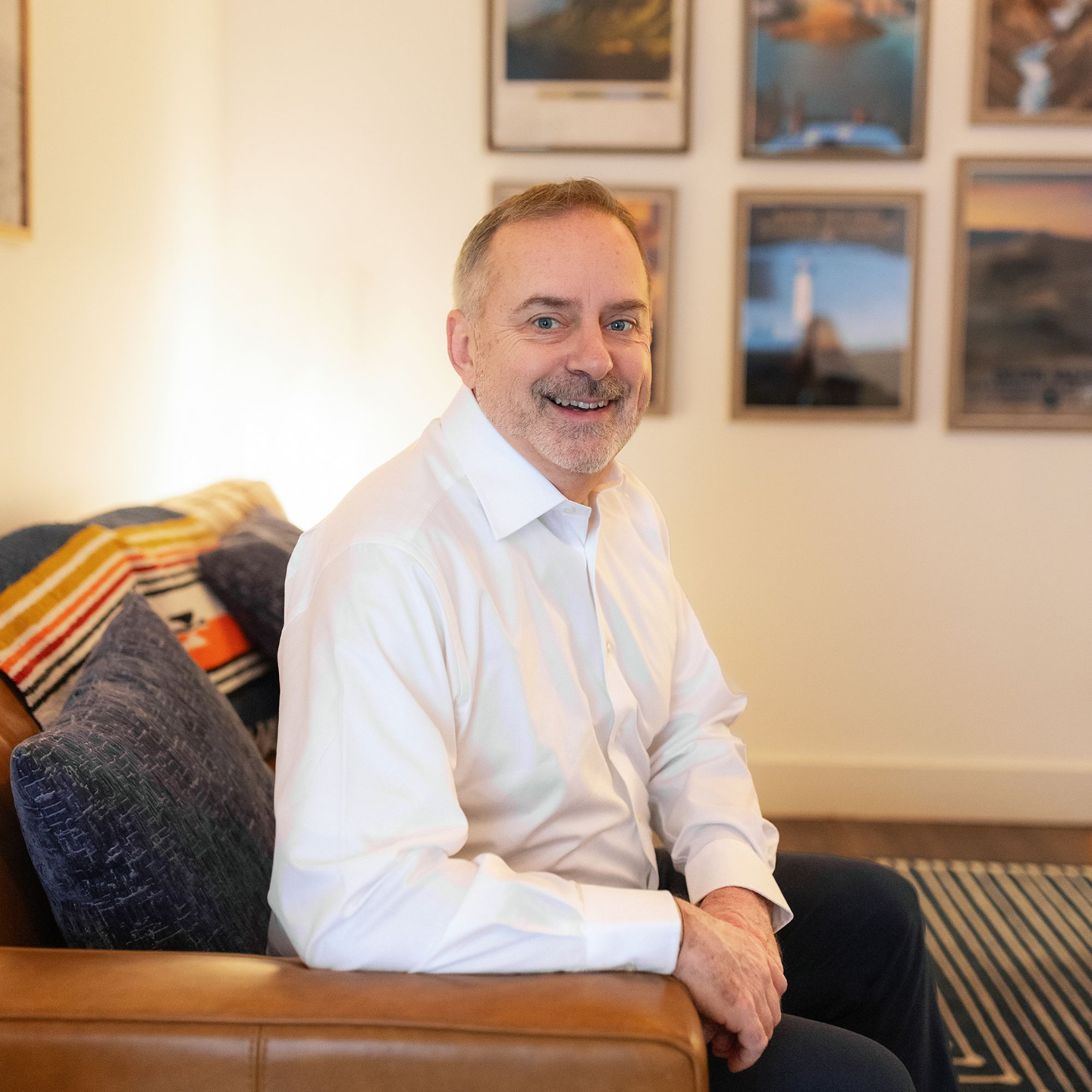 Robert Blender, LMSW, men's therapist at Metro-Detroit Men's Therapy, seated in the therapy office