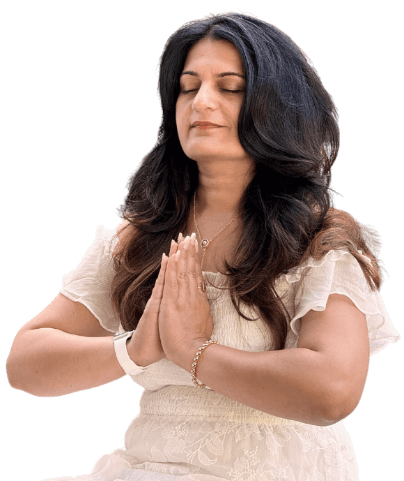 Shaveta folded hands with arm on table