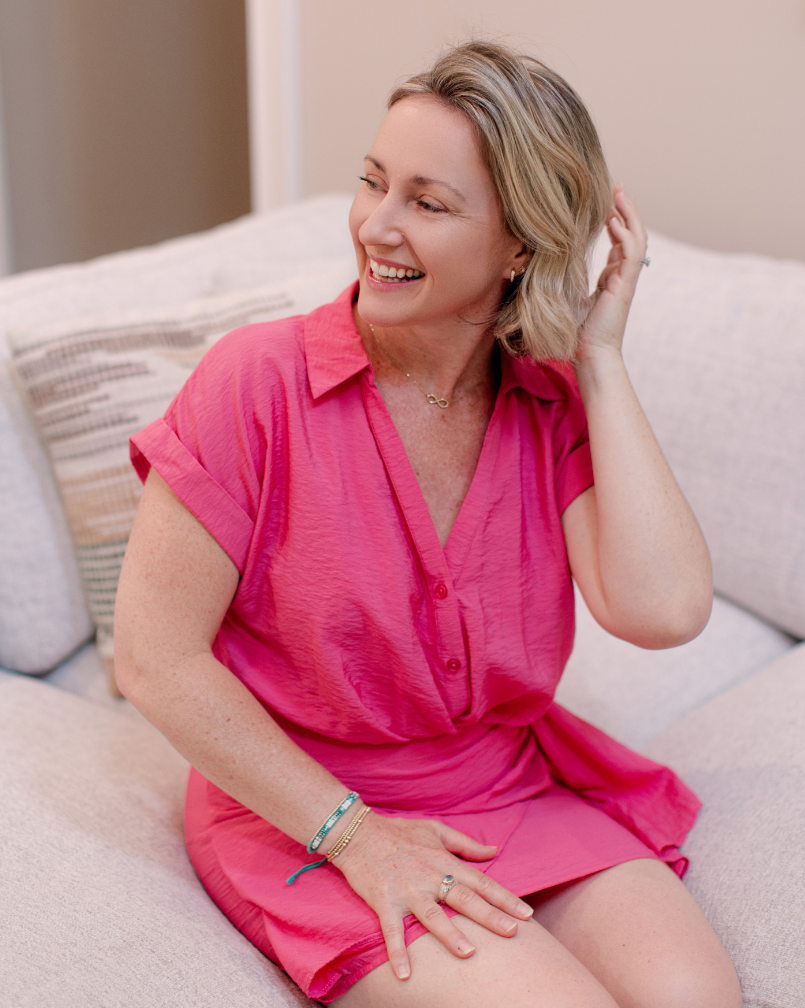 woman smiling at laptop