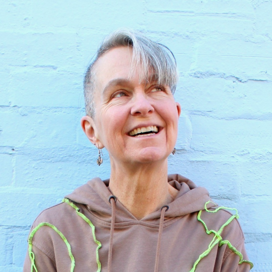 A headshot photo of Erika Leonard