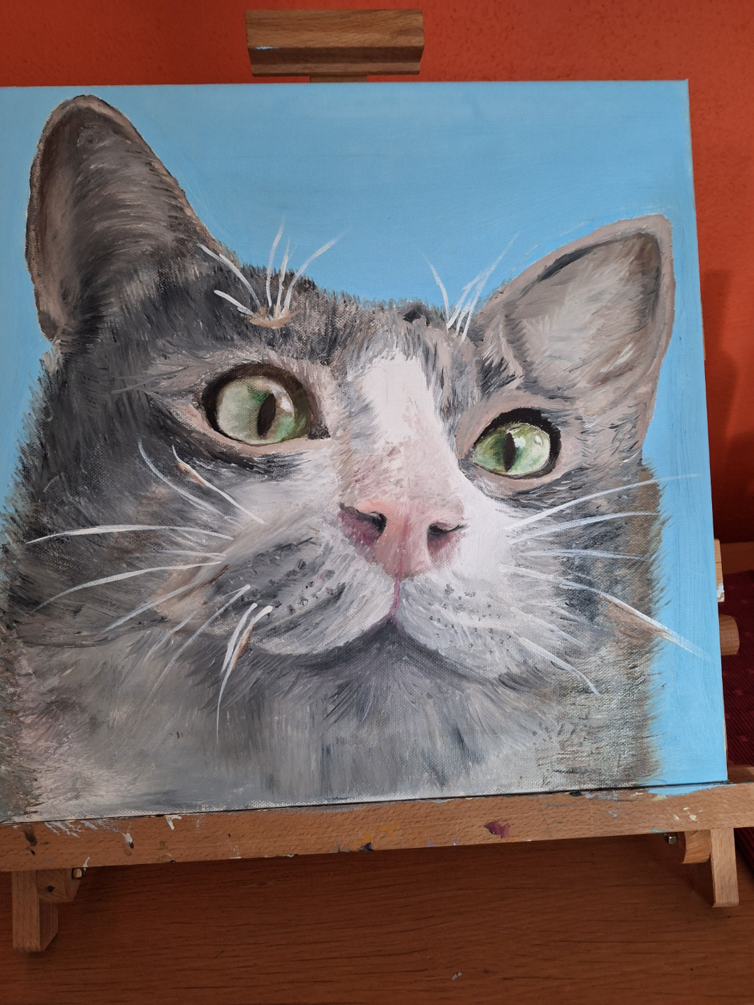 Student oil painting of a realistic cat portrait from the animal painting course