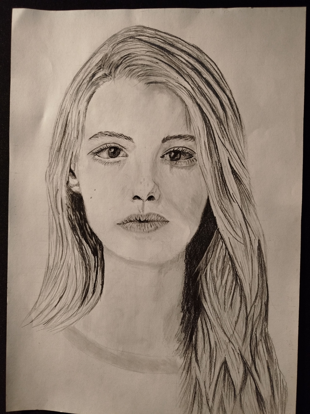 Student pencil portrait of a woman created using the Loomis method