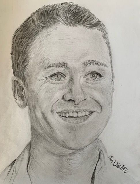 Student pencil portrait of a man created using the Loomis method