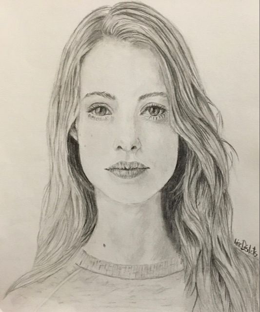 Student pencil portrait created using the Loomis method