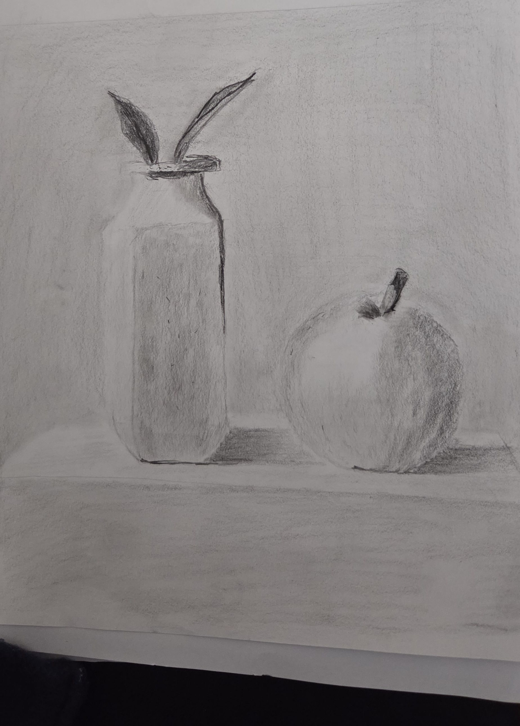 student still life drawing of a burger