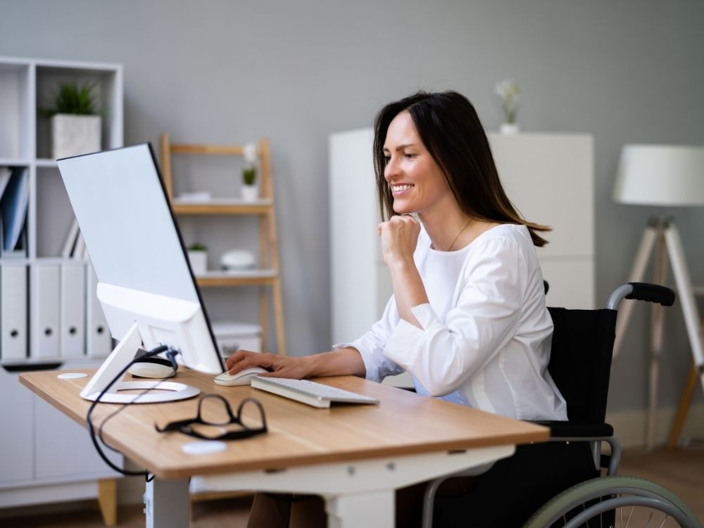 Content woman at desk