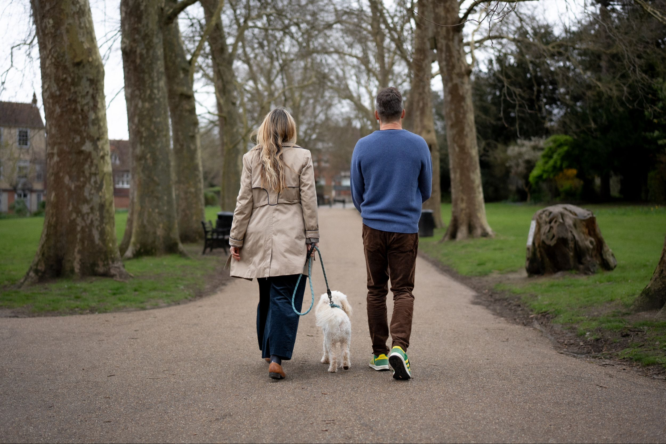 Nick Wright and Hannah Alexander-Wright walking with their dog
