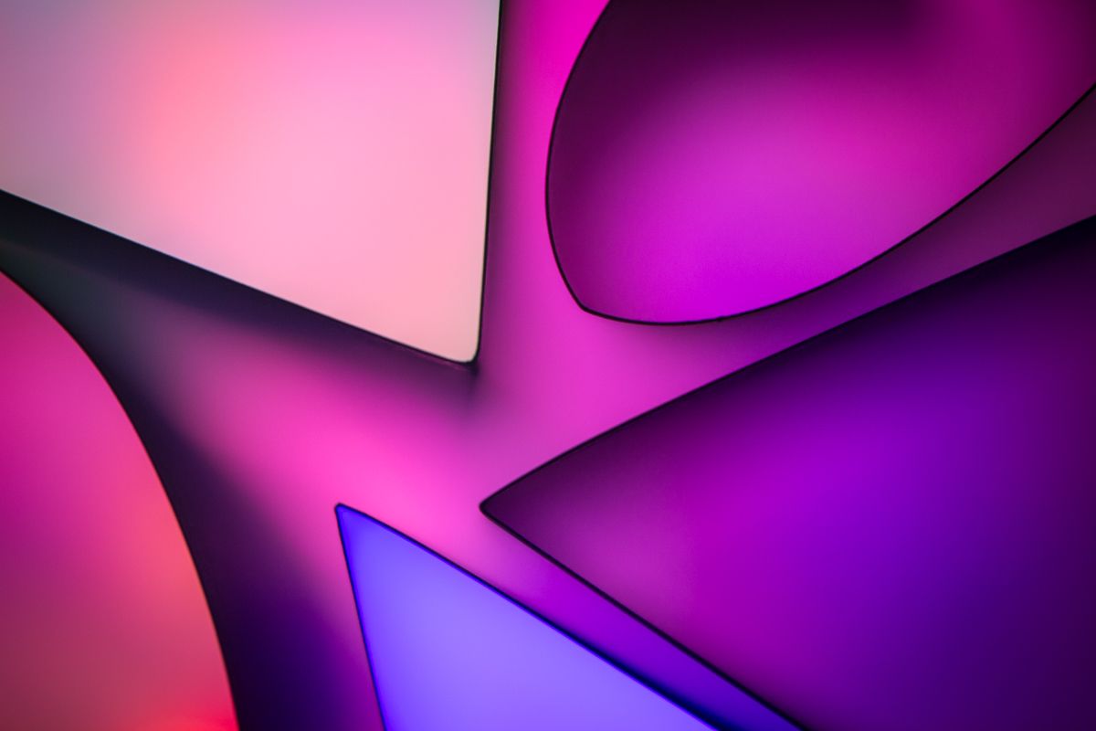 A photograph of a finger popping a soap bubble, a how to creative photography tutorial about how to take high speed bubble photography.