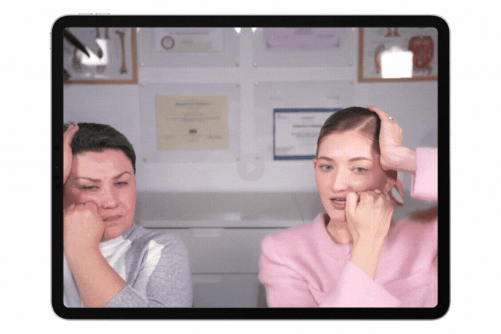 GIF of Valeriia doing forehead index rub