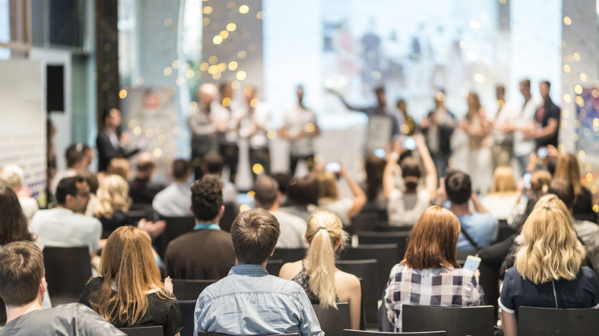 A full room of people gathered together