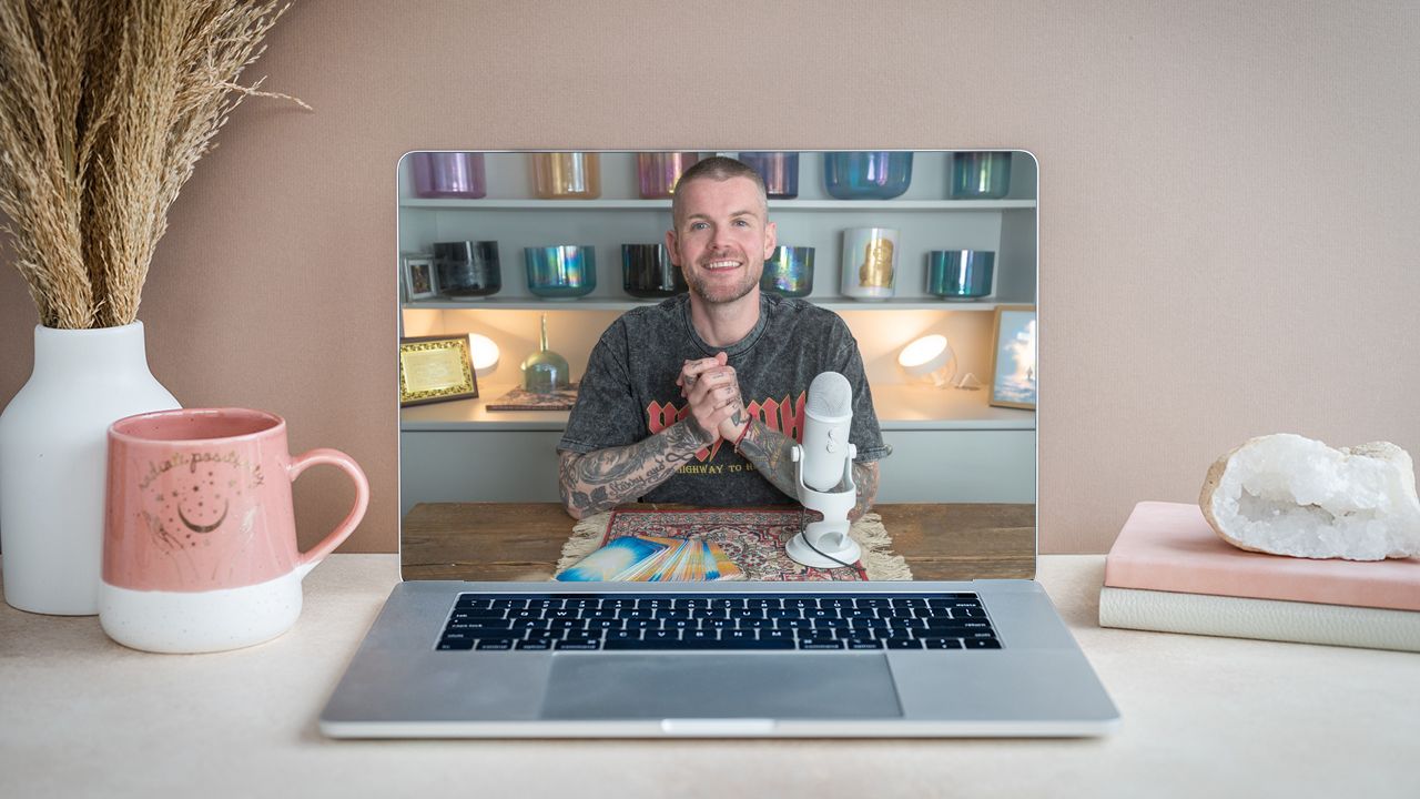 An image of an ipad with Kyle hosting a live workshop on it