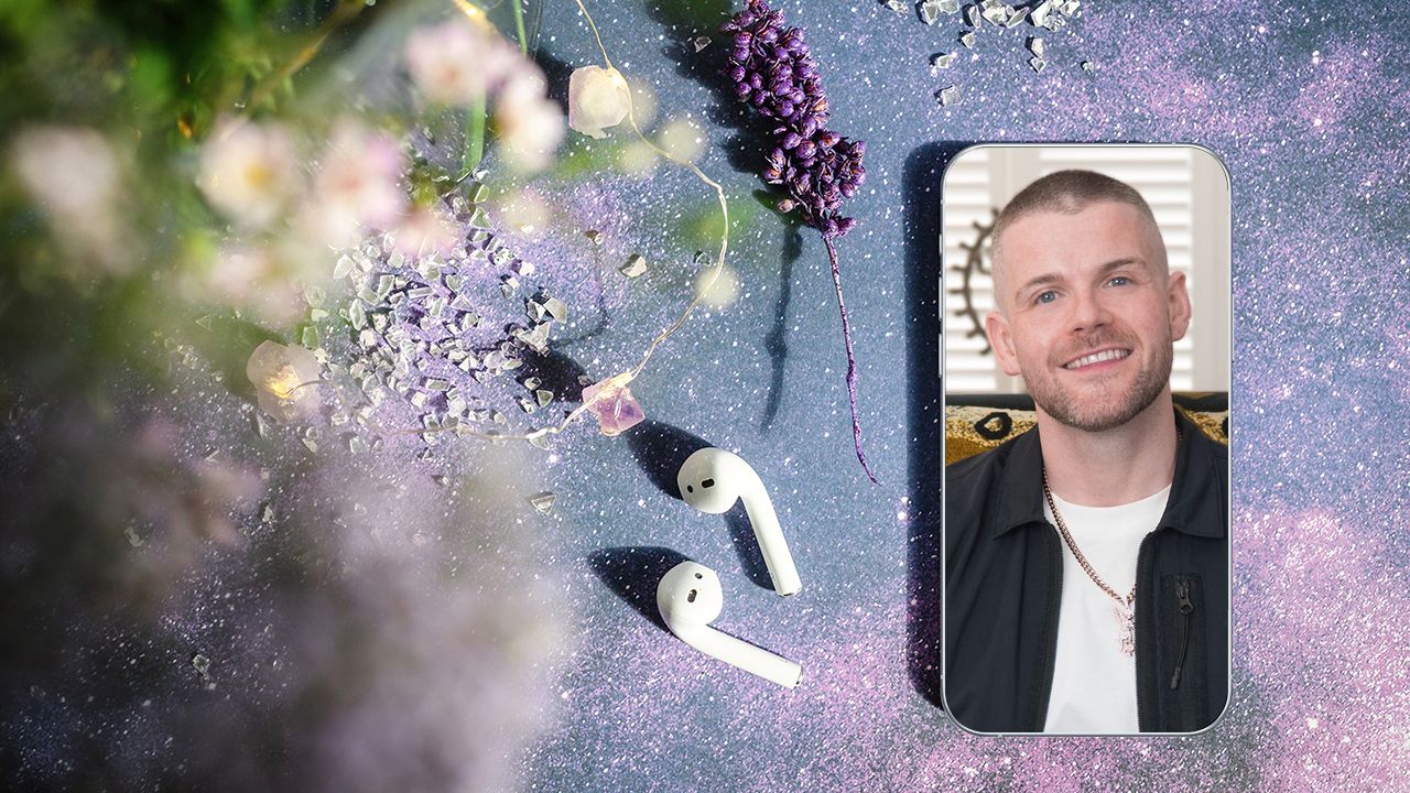 A photograph of Kyle Gray sitting on a chair