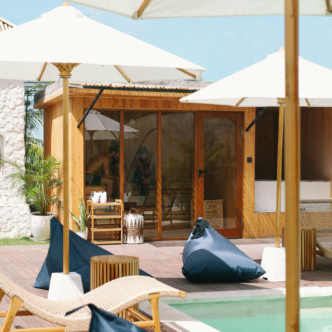 Palm trees and the ocean during sunset