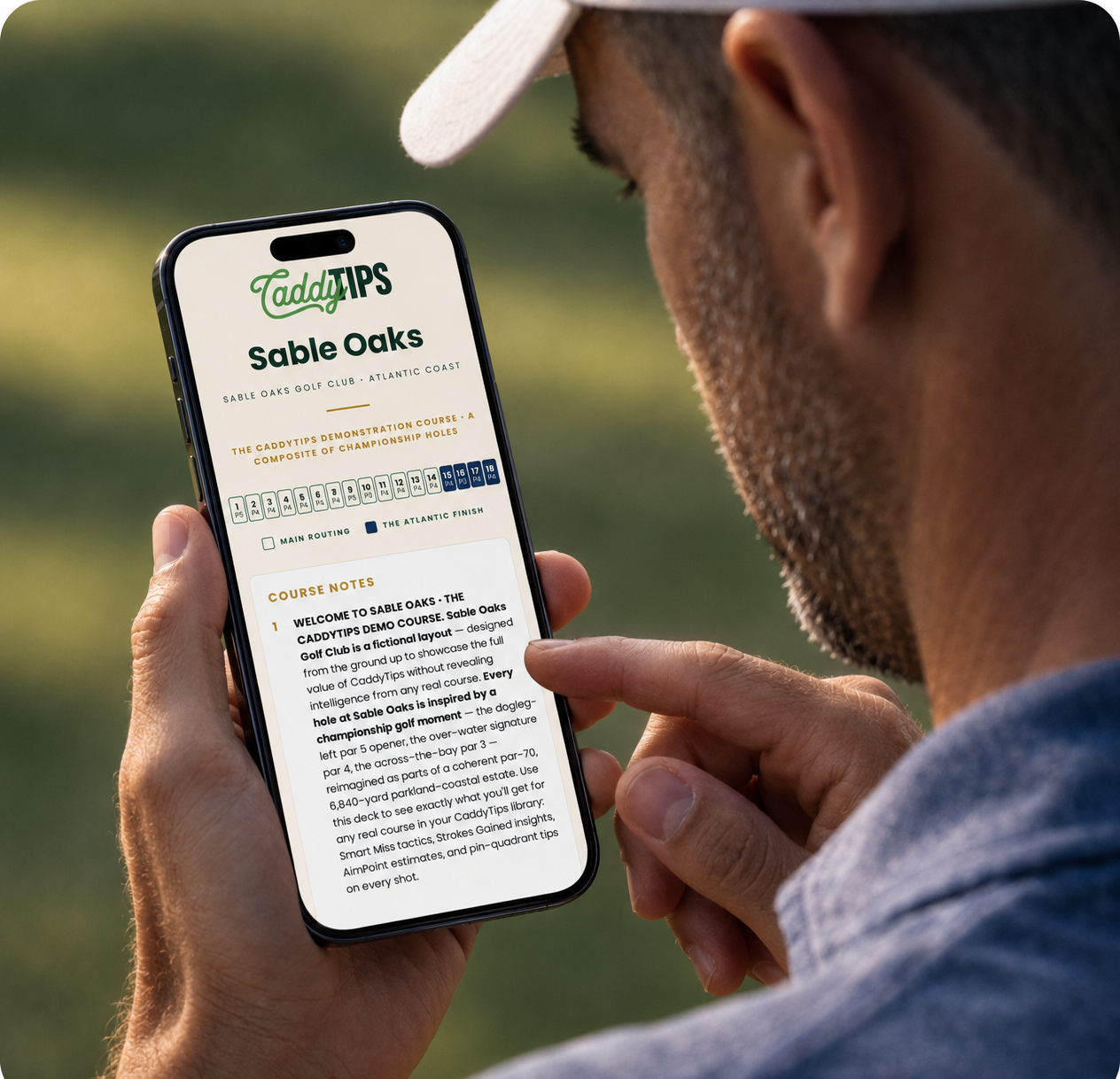 Golfer using CaddyTips on phone