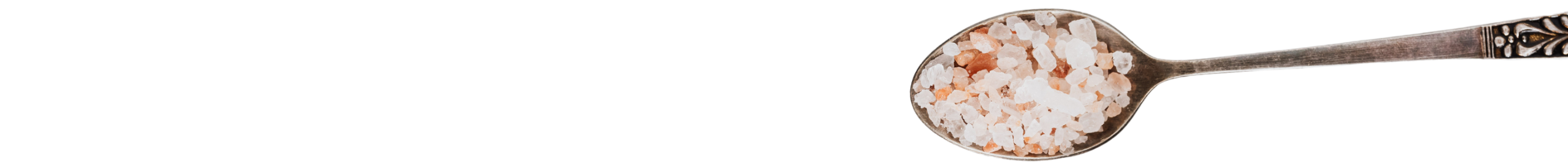 decorative image of teaspoon containing rock salt