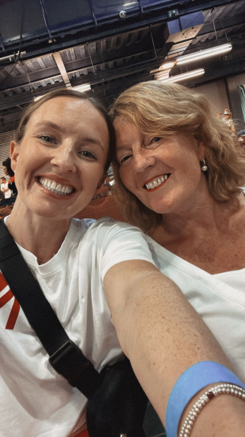 Meg with a parent at an Irish dance competition