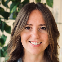 Young smiling woman with long brown hair