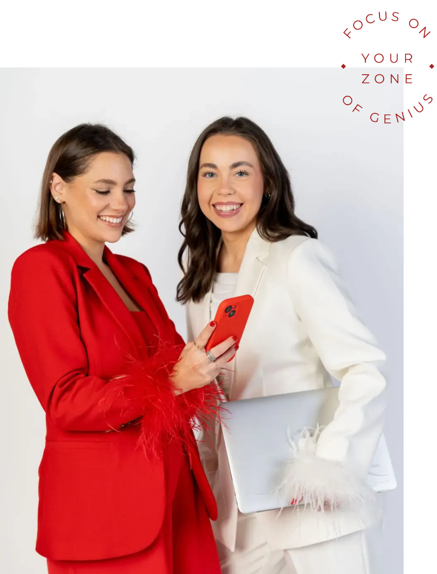 Emma Tessler and team member looking at phone