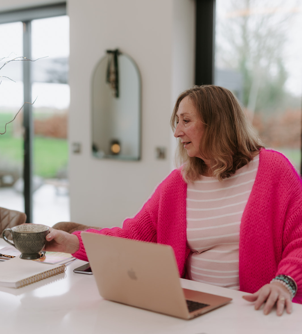 Elizabeth James holding the Baby Class Blueprint training guide for baby class teachers