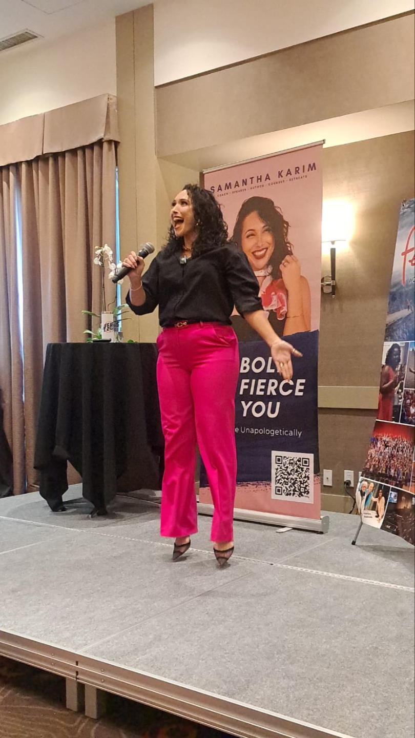 Samantha Karim jumping on stage