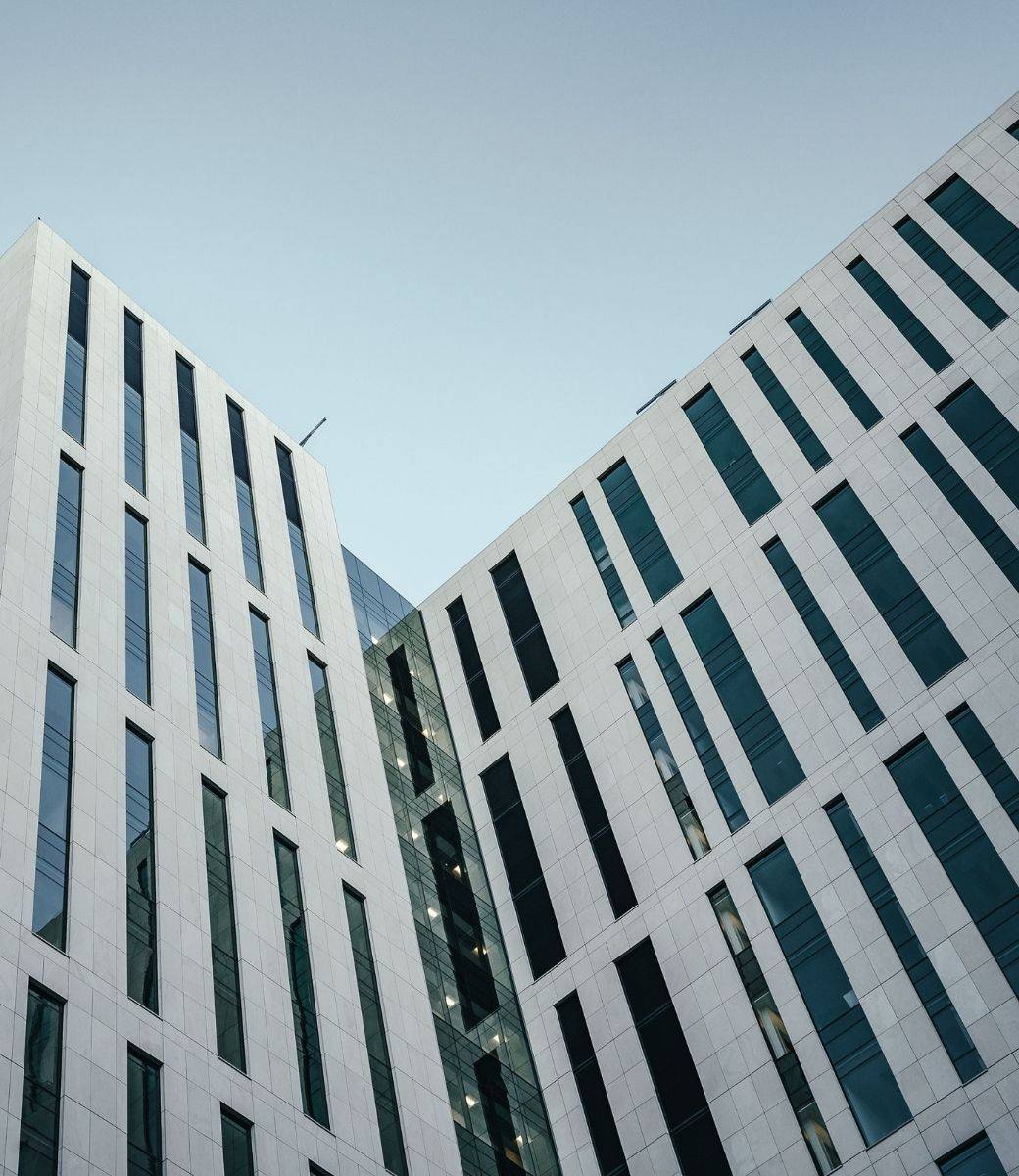 a white office building with tall, narrow windows