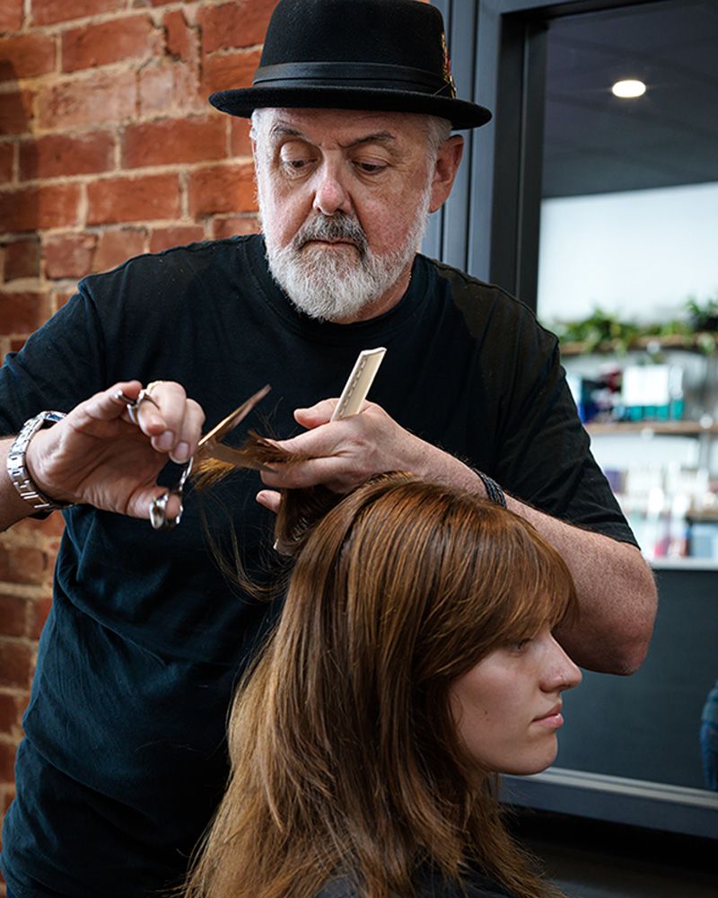Paul Dare cutting hair