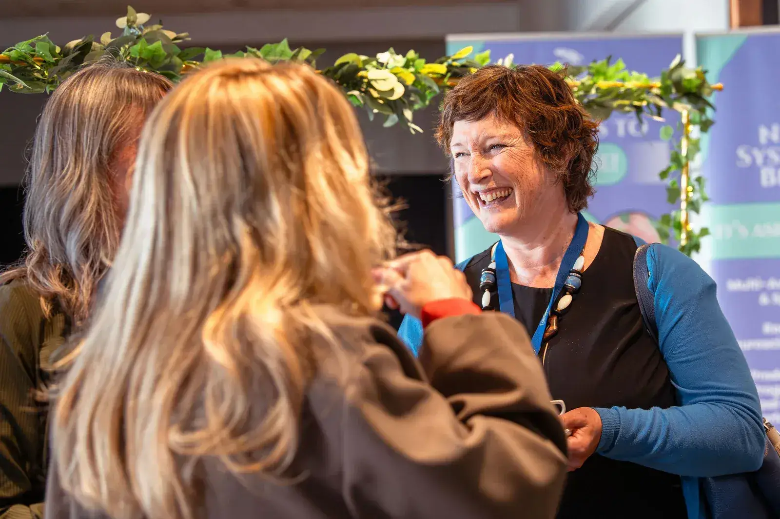 A conversation between attendees at The Connection 2026