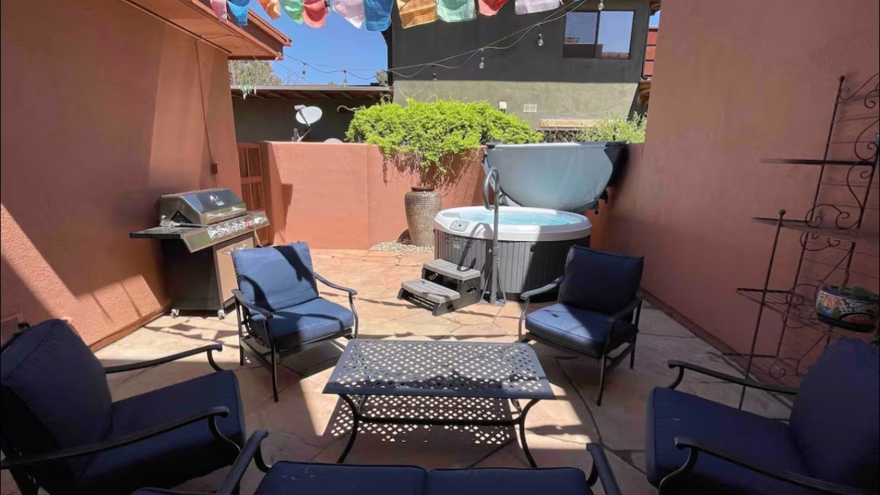 Villa outdoor lounge area and hot tub
