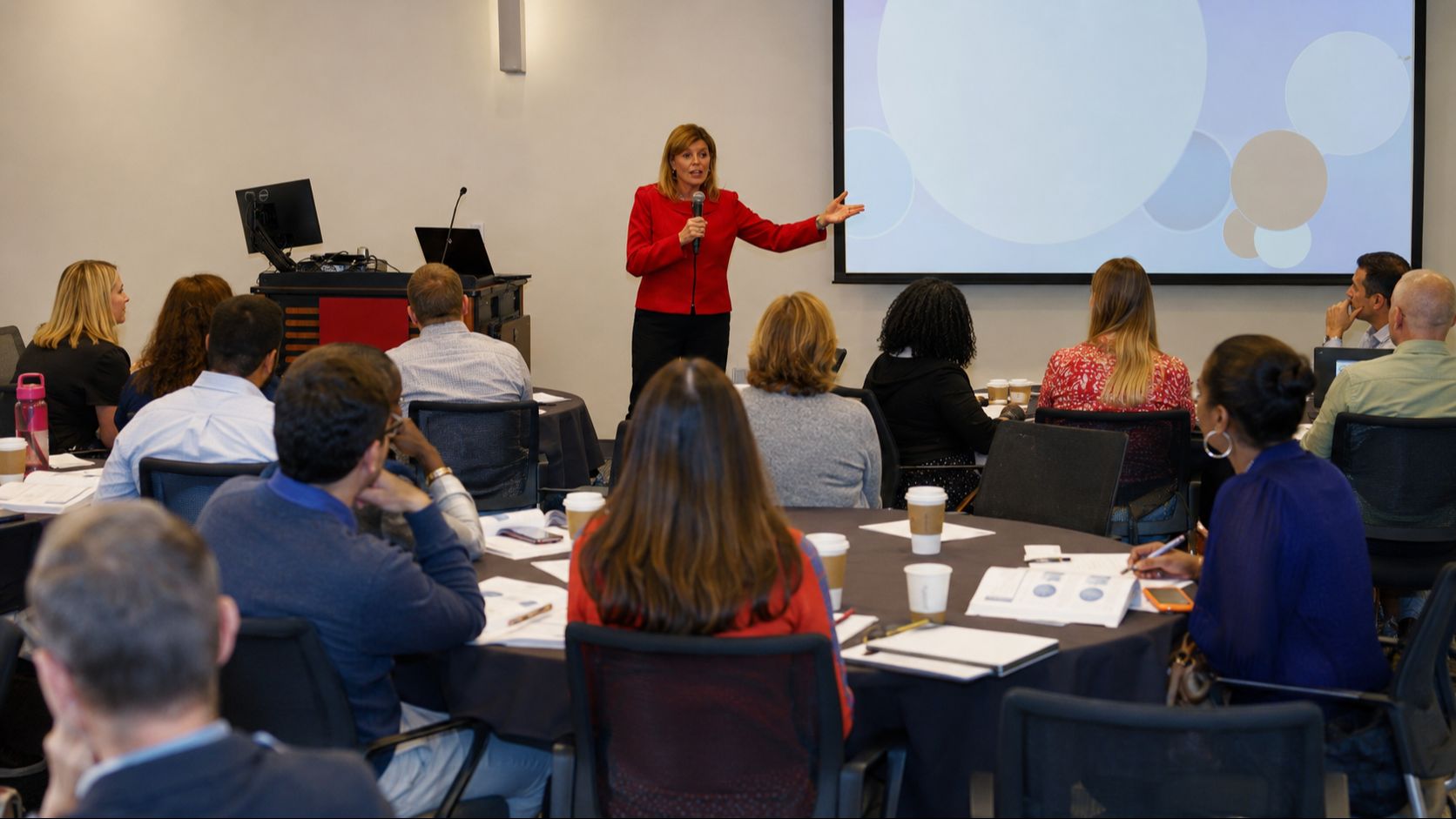 Dr. Janel Anderson facilitating a presentation skills training workshop for professionals