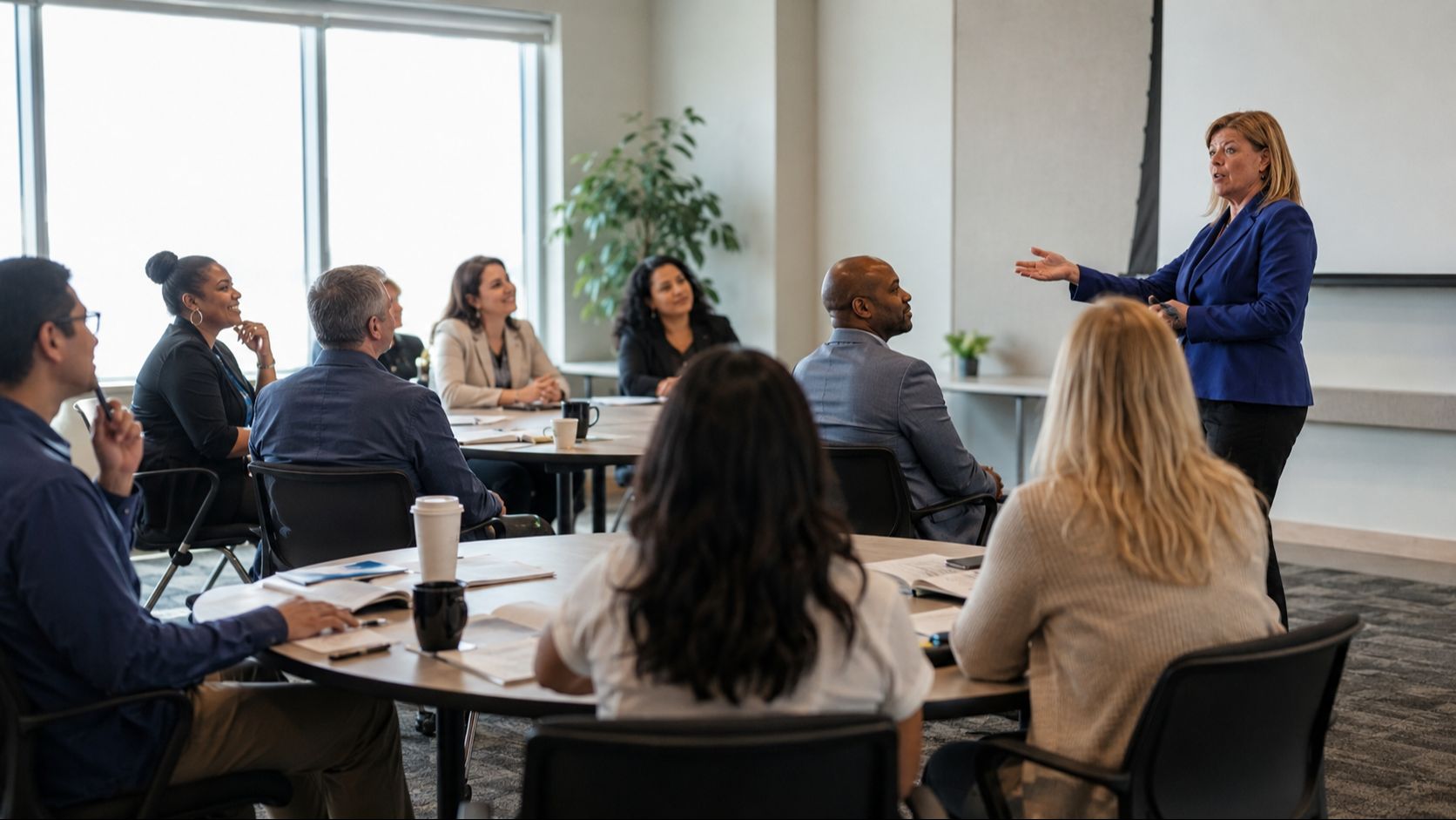 Dr. Janel Anderson leading a meeting facilitation training workshop for leaders