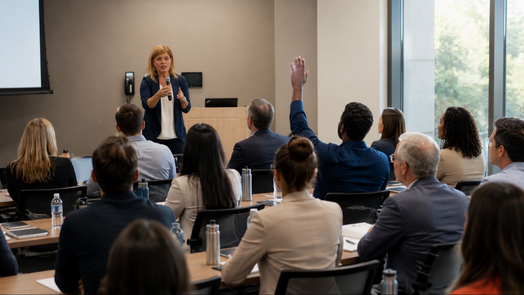 Dr. Janel Anderson leading a customer communication training session for service professionals