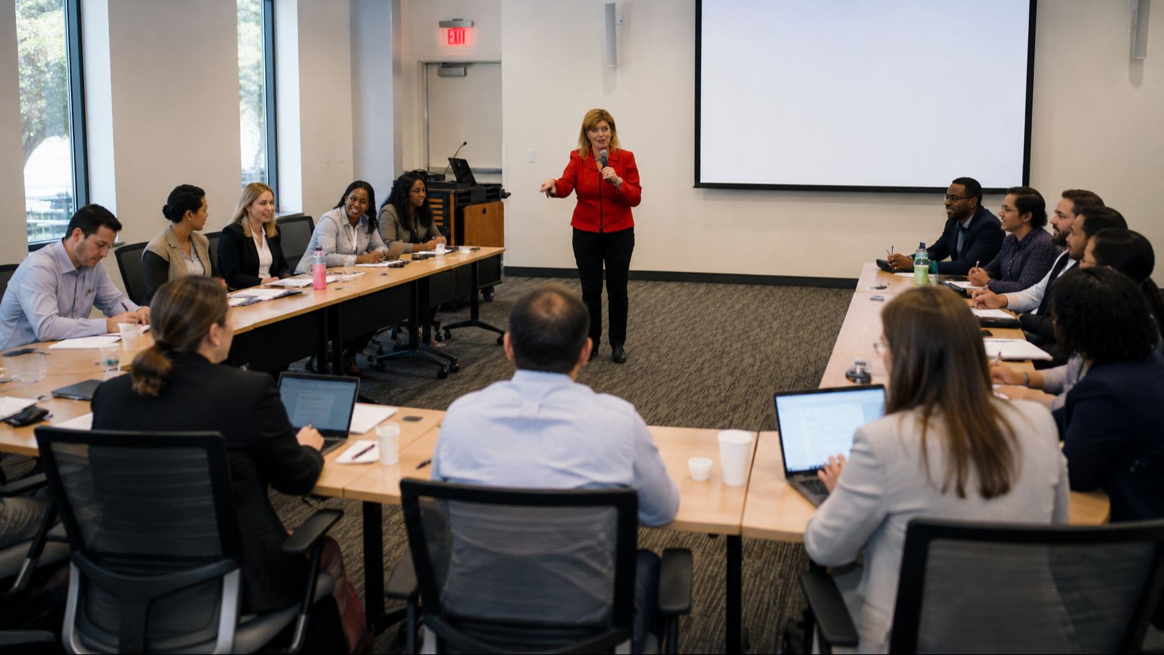 Dr. Janel Anderson facilitating a hybrid team leadership training workshop for managers