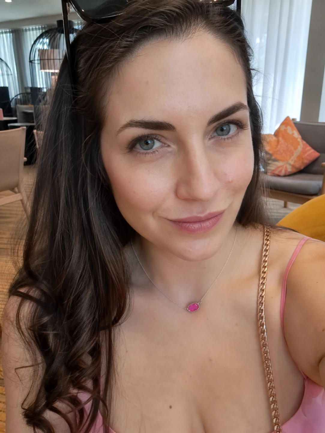 Jeweller Veronica wearing a pink gemstone necklace