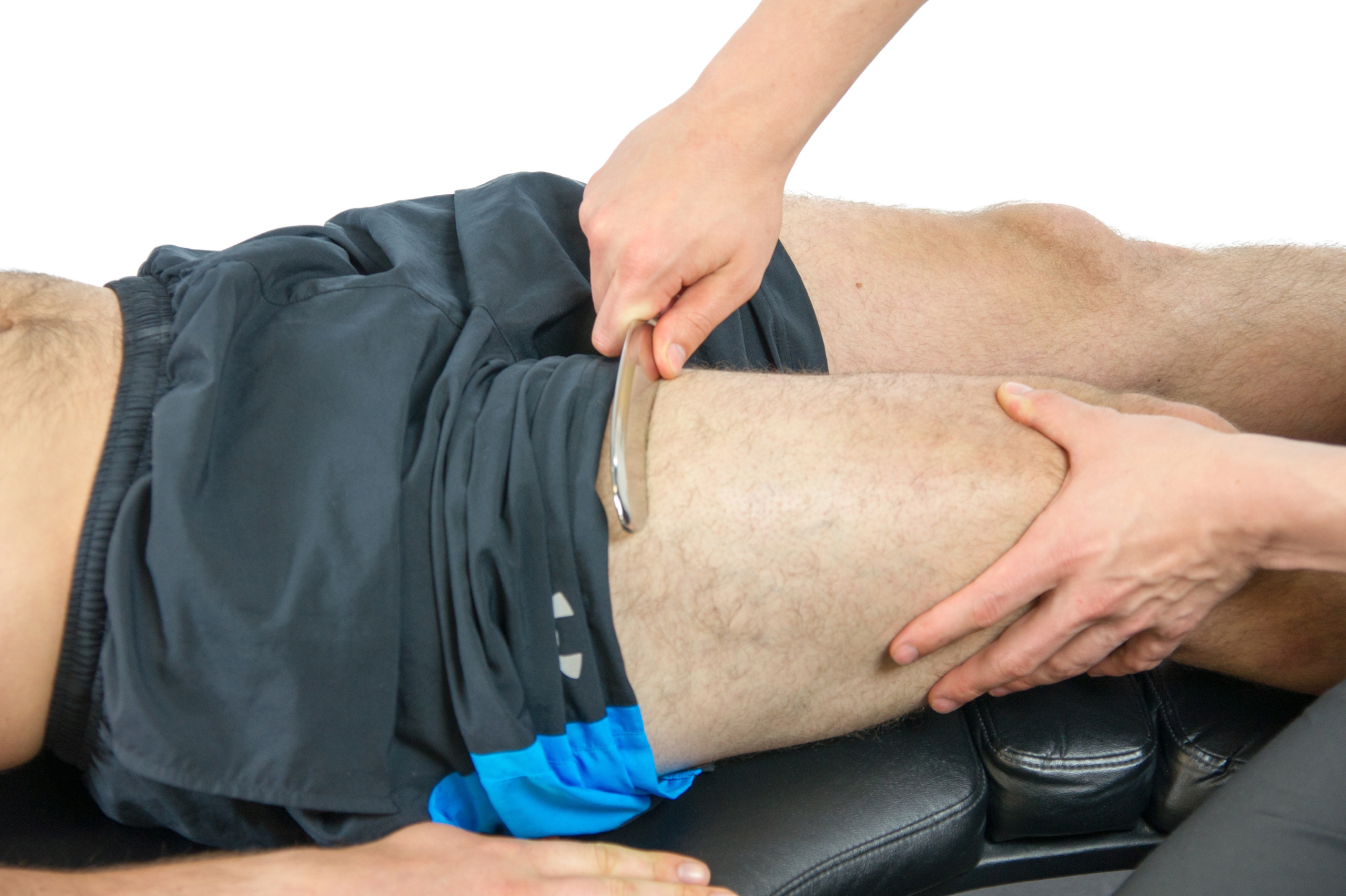 IAT One all-purpose IASTM tool used for general massage on large muscle group – ergonomic grip in action