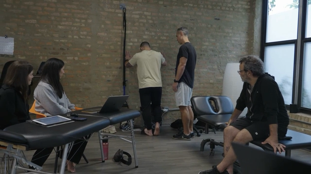 Course participants observing a live movement demonstration