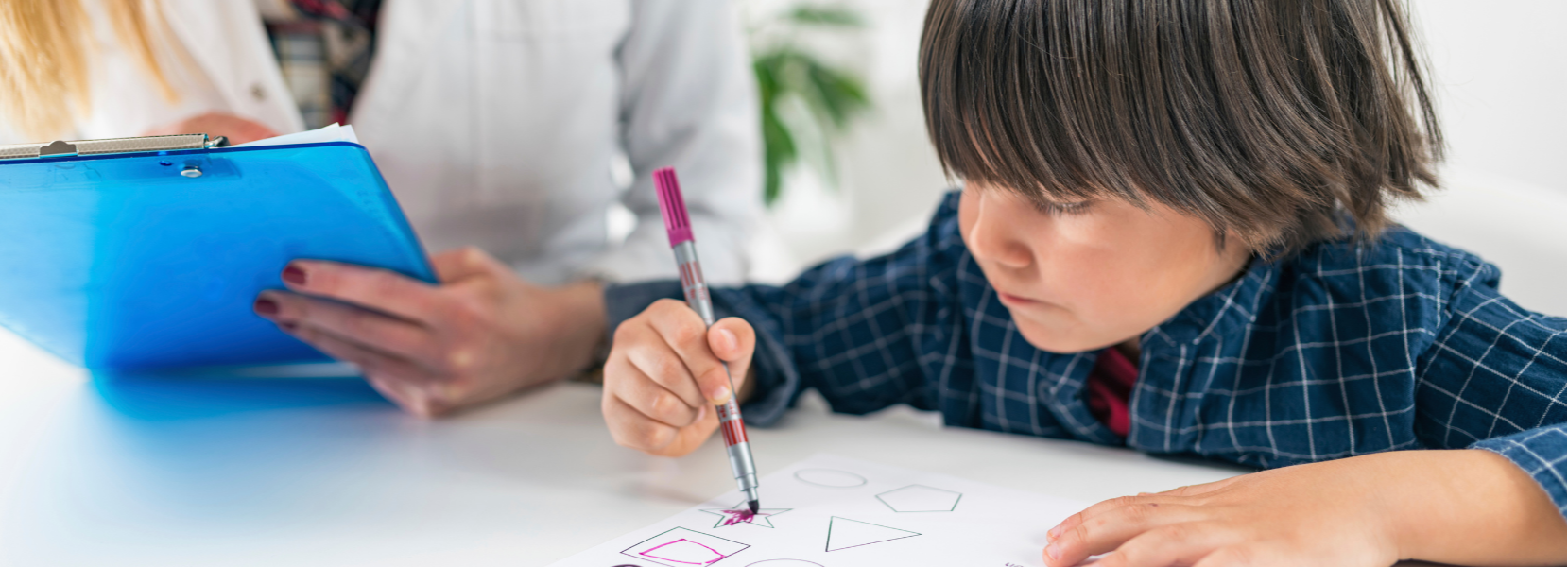 Child participating in an early language intervention session with a speech therapist to support communication and speech development.